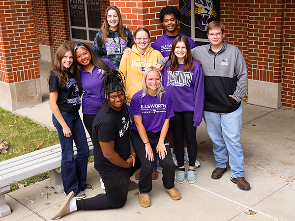 Student ambassadors grouped together outisde. 