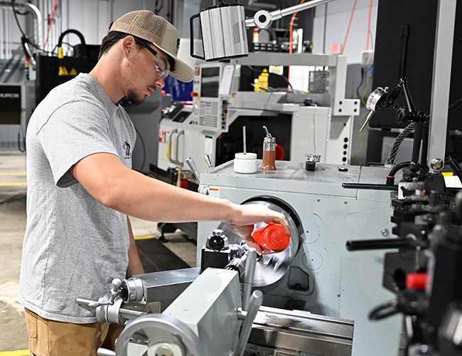 machine-tool-student-working-on-equipment