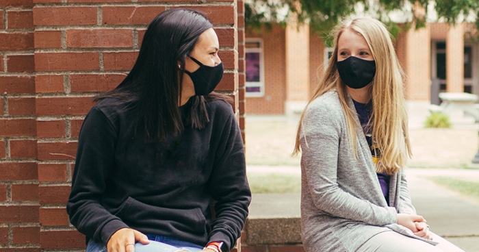 two-students-with-covid-masks