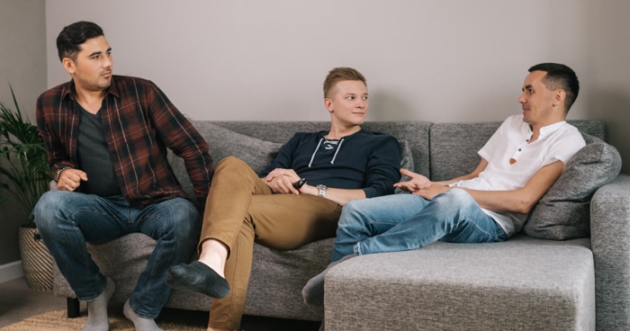 three-guys-sitting-on-couch