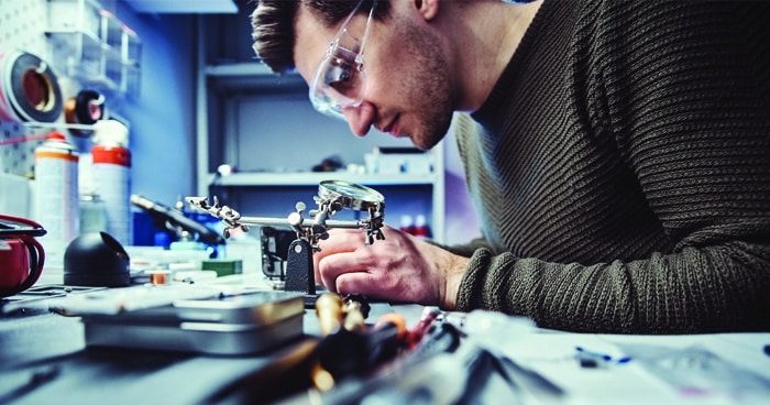 man-working-on-table