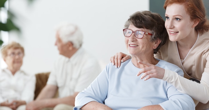 elderly-woman-talking-with-young-girl