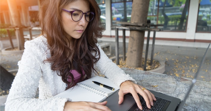 woman-on-computer-outside