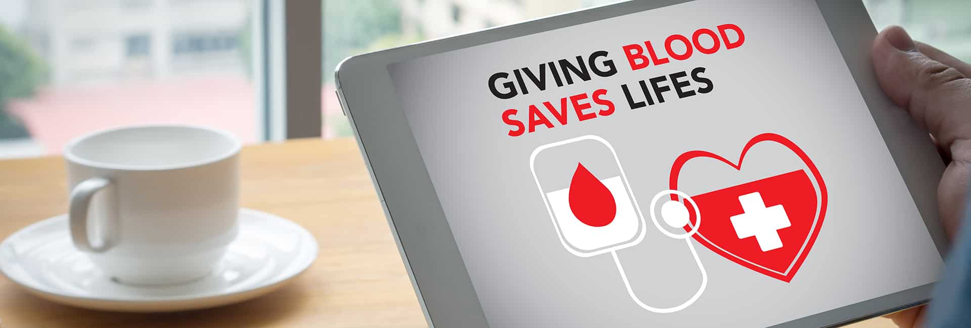 blood-drive-coffee-cup-computer-with-giving-blood-saves-lives