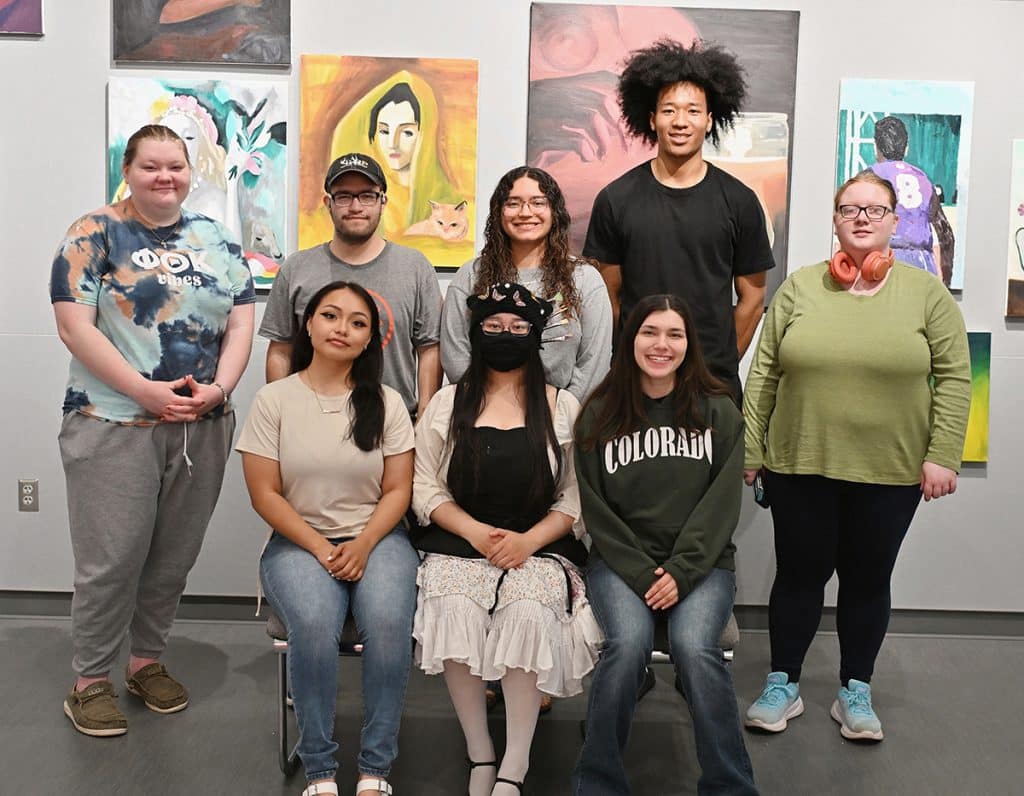 Art-exhibit-students-in-gallery
