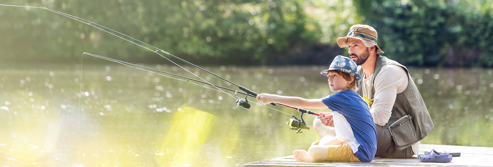 father-son-fishing-at-lake