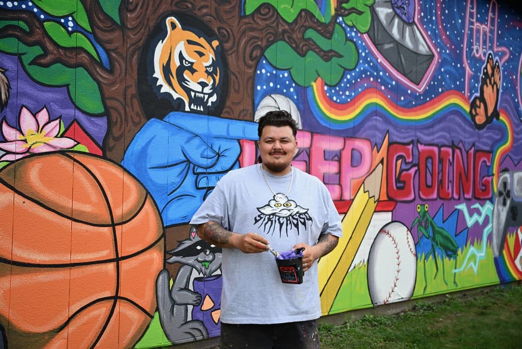 siri-in-front-of-mural