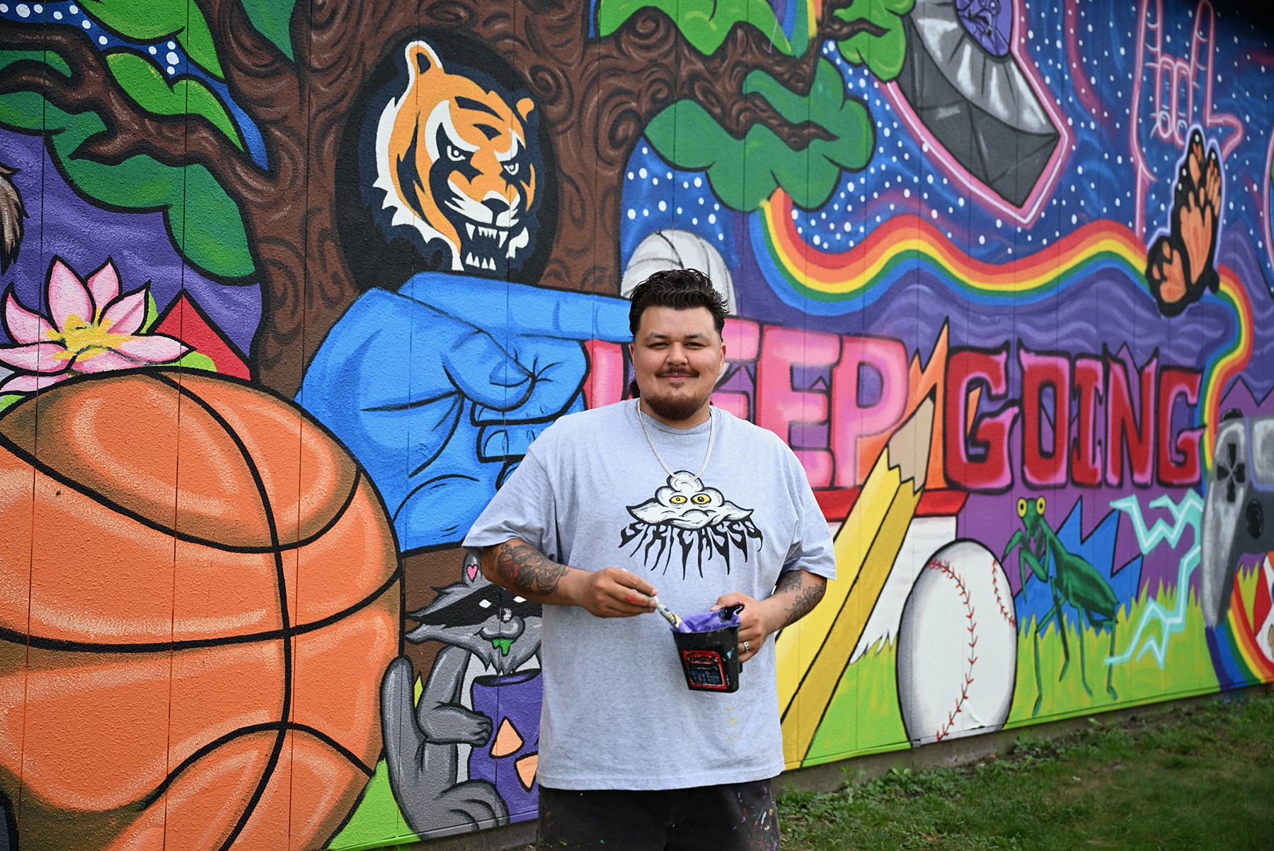 siri-in-front-of-mural