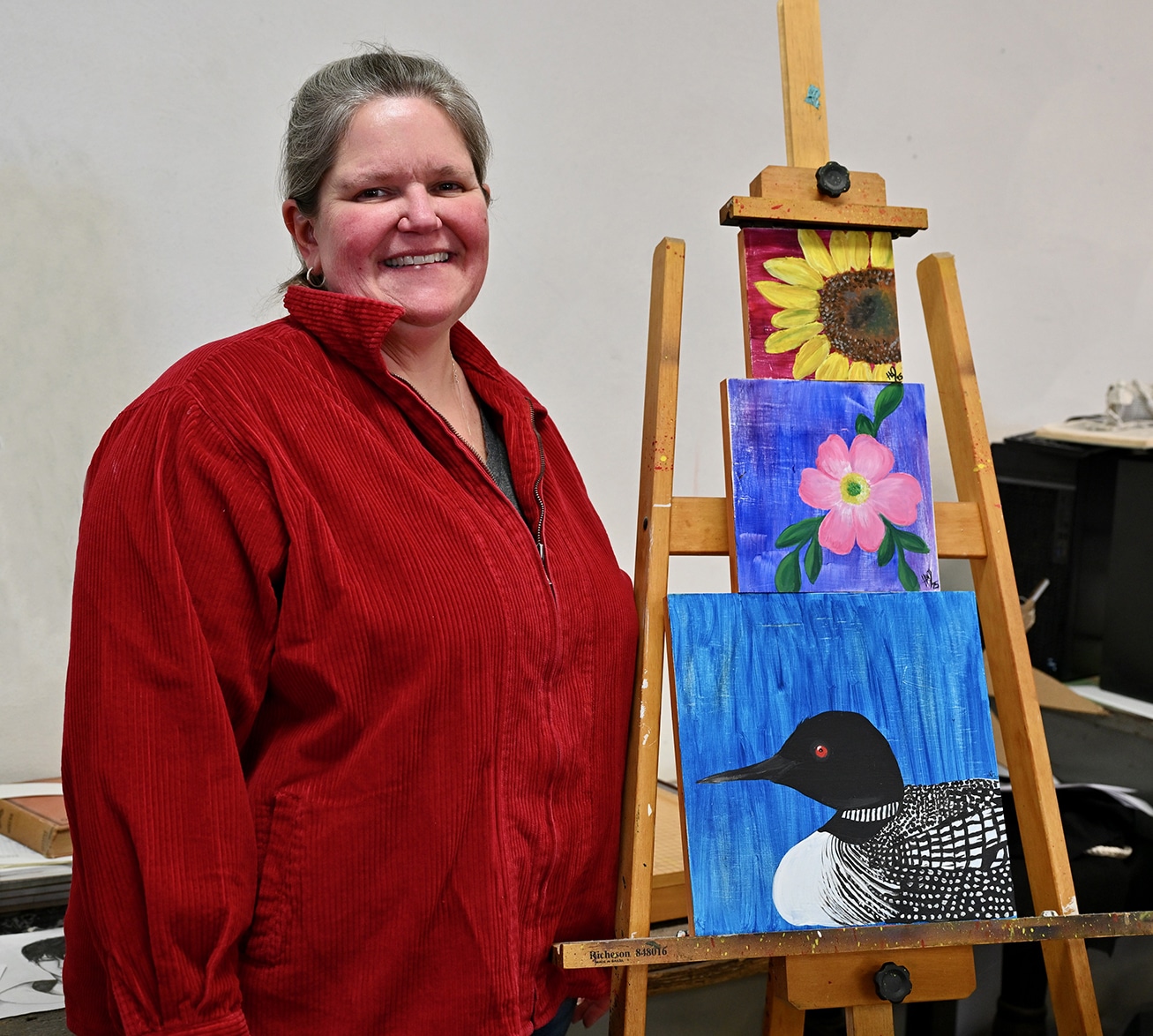 Hallie-crouse-with-paintings